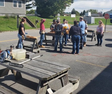 Step Up for Women Construction Pre-Apprenticeship students during a hands-on day of class