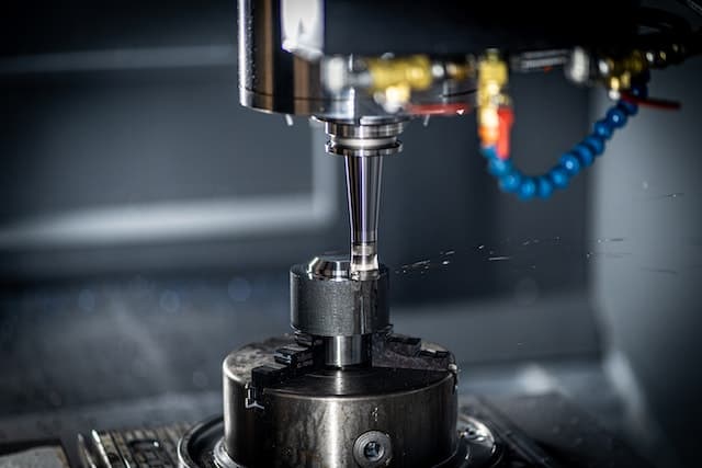 Photo by Daniel Smyth: https://www.pexels.com/photo/close-up-shot-of-a-cnc-machine-8865187/