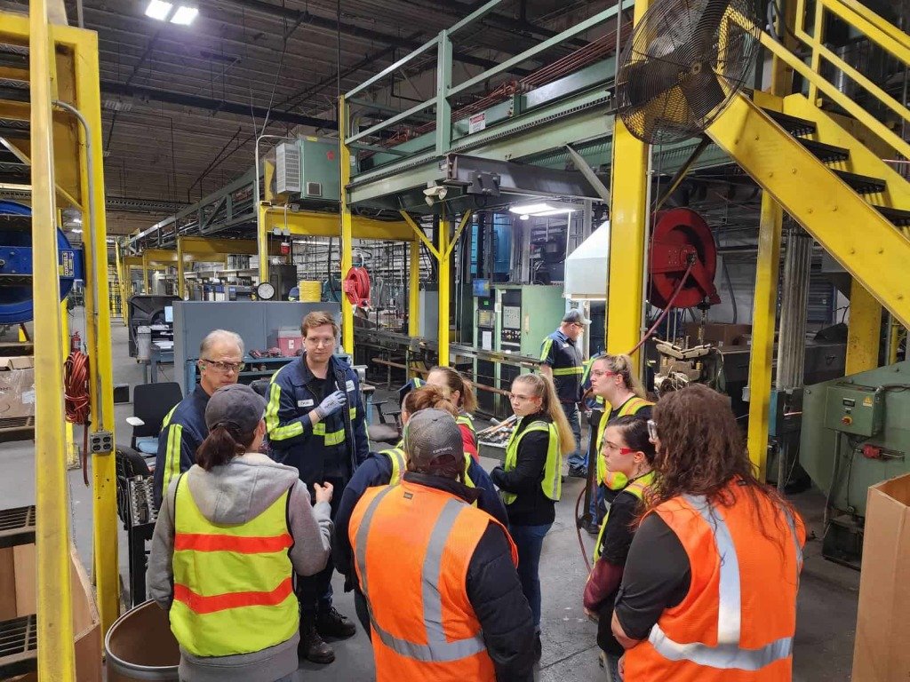 SUFW students on a site tour at Service Wire.