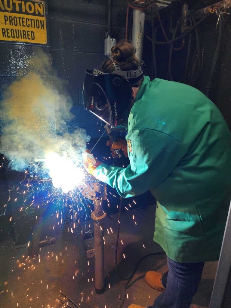 Step Up for Women Construction student learning basic welding skills