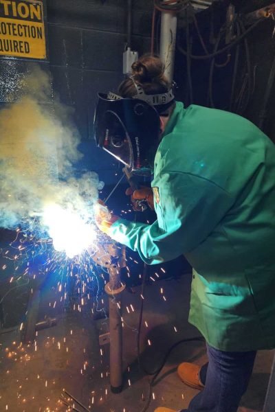 Step Up for Women Construction student learning basic welding skills